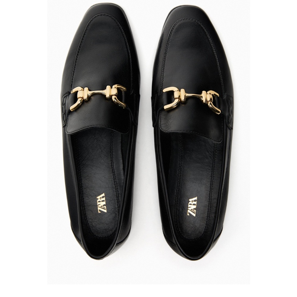 Buckled soft leather loafers.